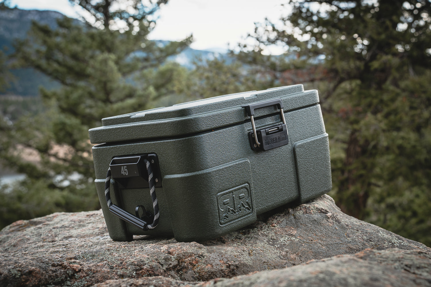 Rugged Road Cooler Sitting on a Mountain