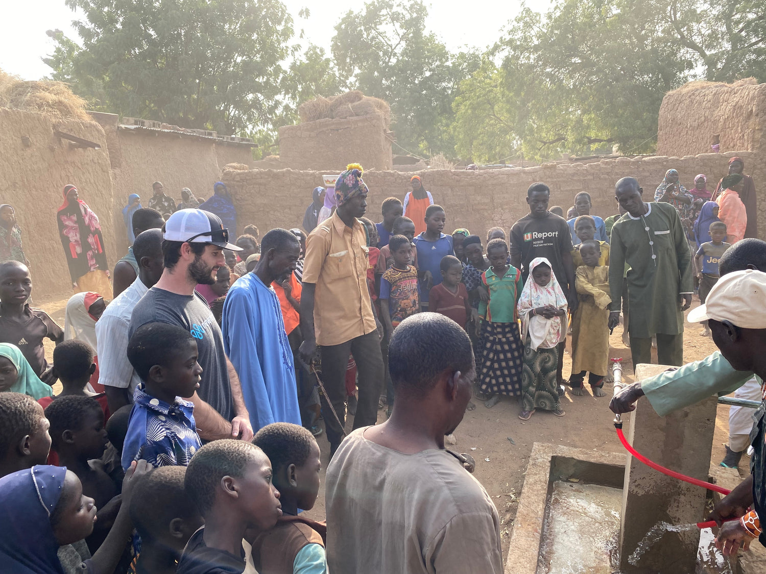 People around a water fountain