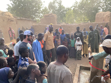 People around a water fountain